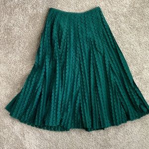 Molly Bracken Pleated green Leaf print skirt, size XS.